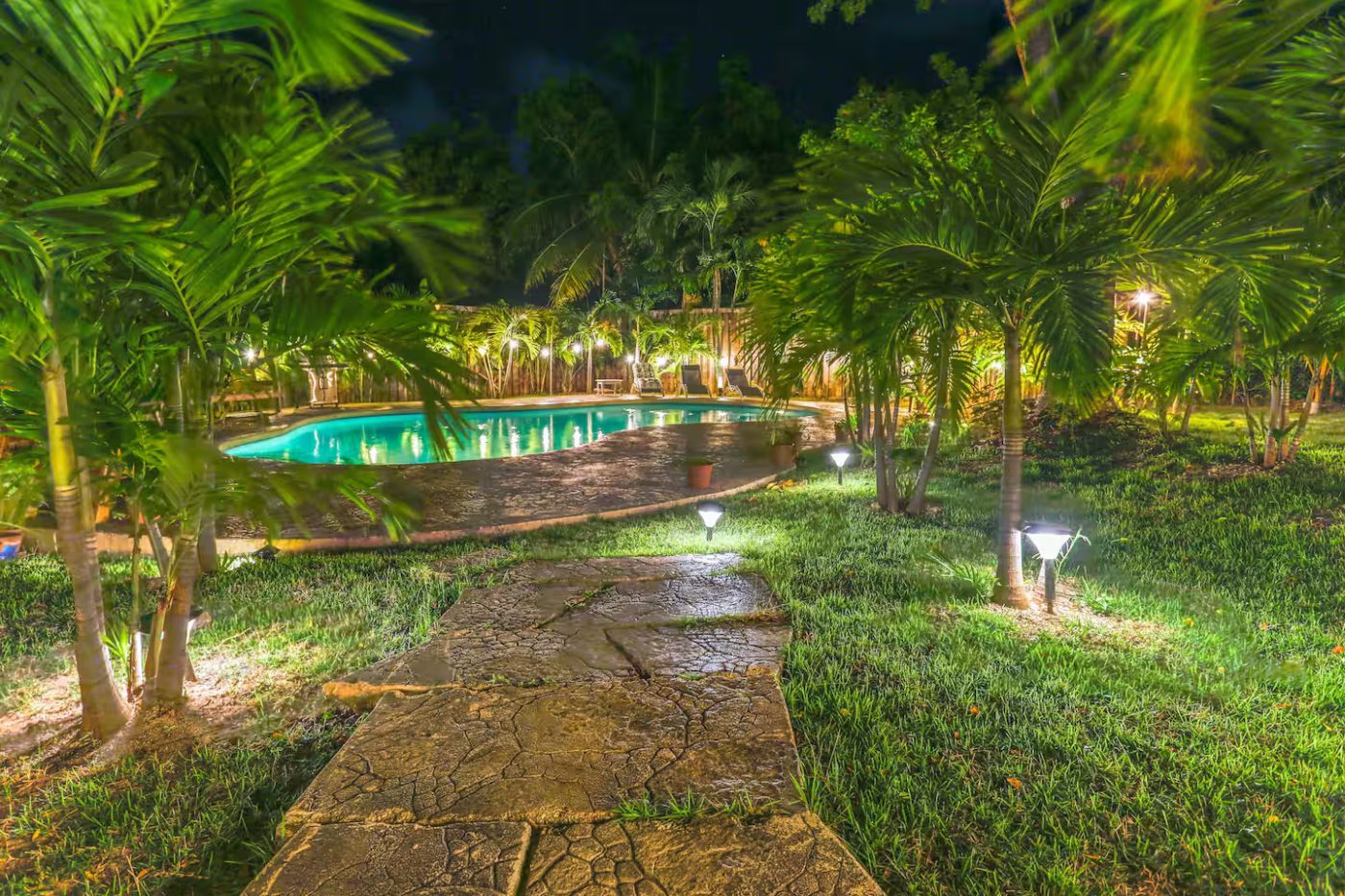 Illuminated Garden Walkways by Night
